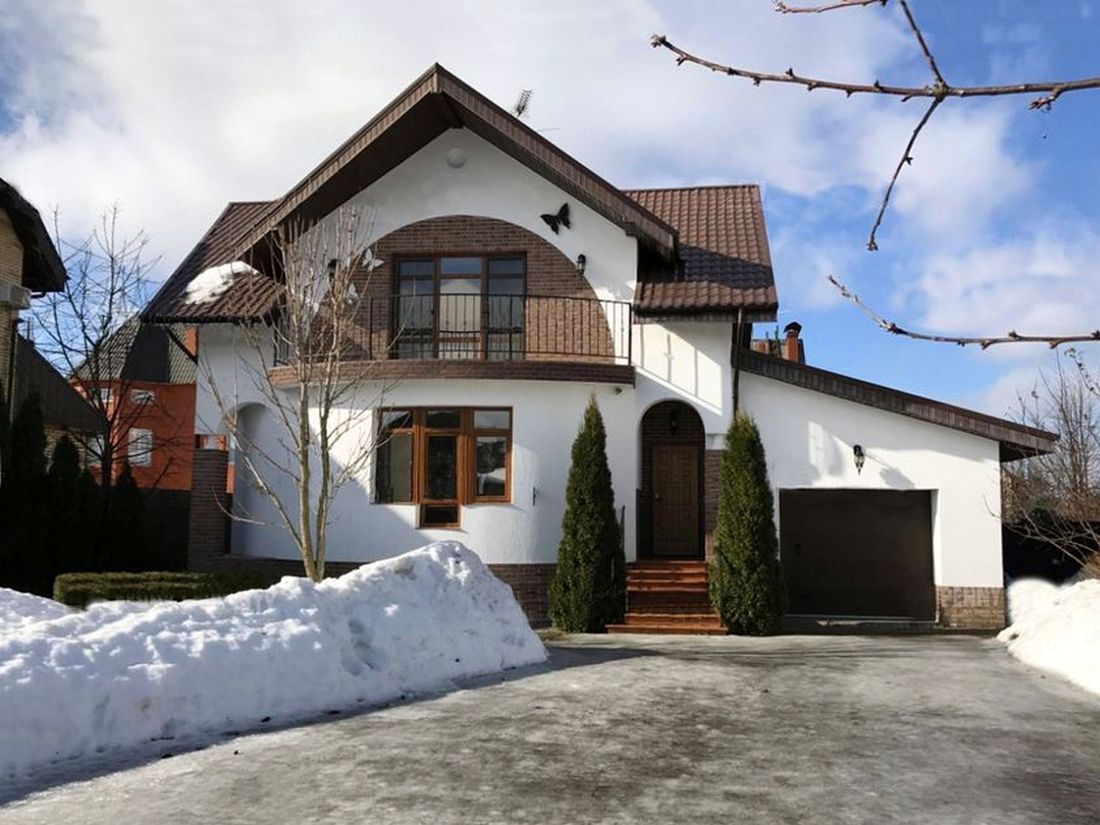 Превью для проекта в портфолио «Проект двухэтажного дома из газобетона «Боген» с полукруглой гостиной, с террасой и гаражом»