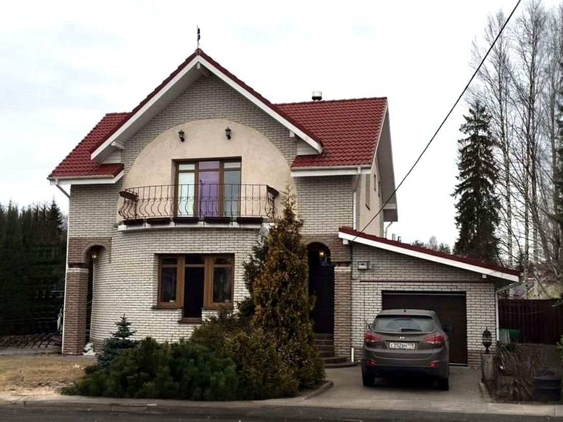 Превью для проекта в портфолио «Проект двухэтажного дома из газобетона «Боген» с полукруглой гостиной, с террасой и гаражом»