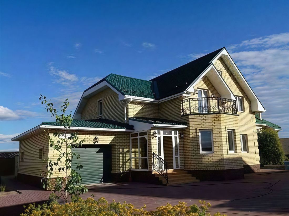 Превью для проекта в портфолио «Проект двухэтажного дома из газобетона «Шевалье» с кабинетом на 1 эт, с эркером и гаражом»